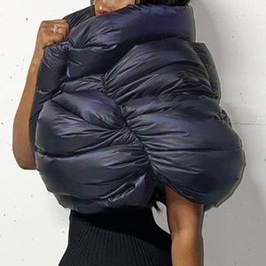 Puffer cape. Can be worn alone or over a coat.